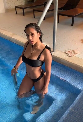 1. Hot Camila Mejia Shows Cleavage in Black Bikini at the Swimming Pool