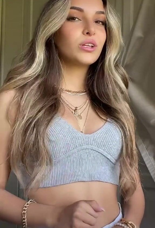 3. Desirable Corinne Pino Shows Cleavage in Grey Crop Top