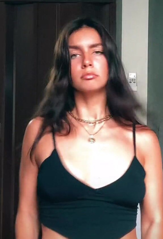 4. Sexy Eleonora Shows Cleavage in Black Crop Top