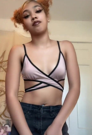 3. Sexy Essence Shows Cleavage in Crop Top