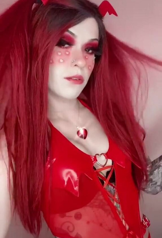 Sweetie Holofox Shows Cleavage in Red Bodysuit