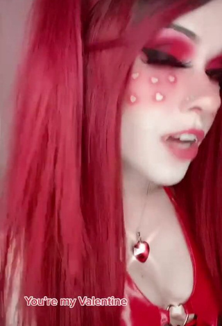 Hot Holofox Shows Cleavage in Red Bodysuit