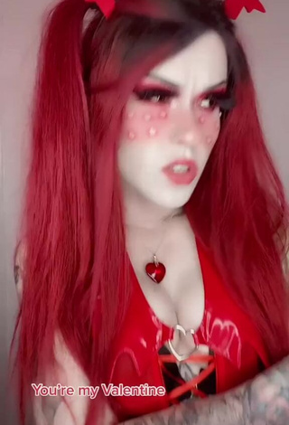 3. Hot Holofox Shows Cleavage in Red Bodysuit