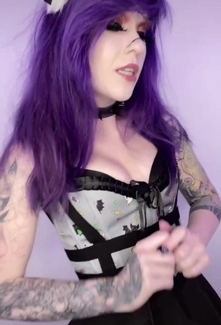 3. Erotic Holofox Shows Cleavage in Dress