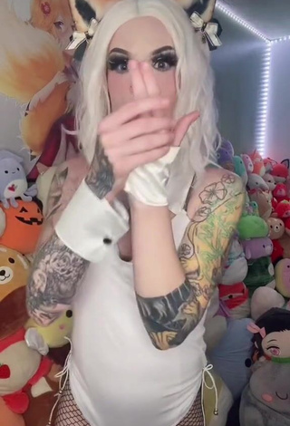 Sexy Holofox Shows Cleavage in White Bodysuit