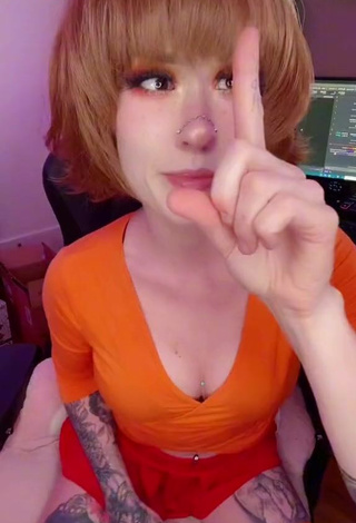 1. Sweetie Holofox Shows Cleavage in Orange Crop Top