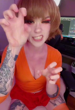 3. Sweetie Holofox Shows Cleavage in Orange Crop Top