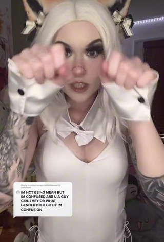 3. Cute Holofox Shows Cleavage in White Bodysuit