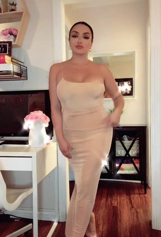 4. Desirable Alma Ramirez Shows Cleavage in Beige Dress and Bouncing Boobs