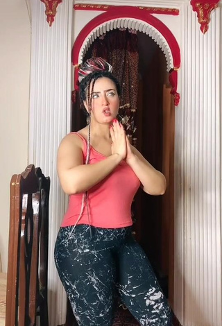 Hot Israa Nageeb Shows Cleavage in Pink Tank Top