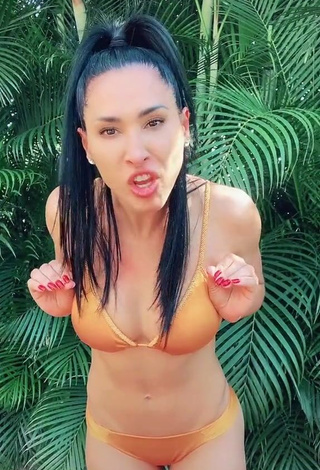 3. Hot Jaqueline Shows Cleavage in Orange Bikini