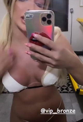 4. Jaquelline Shows Cleavage in Erotic White Bikini