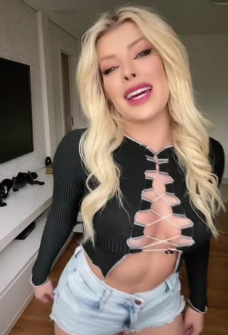 Cute Jaquelline Shows Cleavage in Black Crop Top