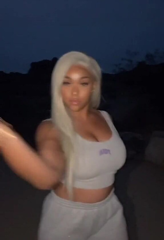 Desirable Jordyn Woods Shows Cleavage in Grey Crop Top