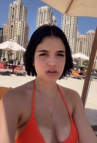 4. Hot KeyZaraOfficial Shows Cleavage in Orange Bikini Top