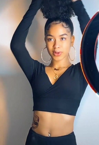 1. Lanii Kay Shows Cleavage in Alluring Black Crop Top