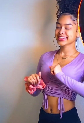 3. Lanii Kay Looks Sweetie in Purple Crop Top