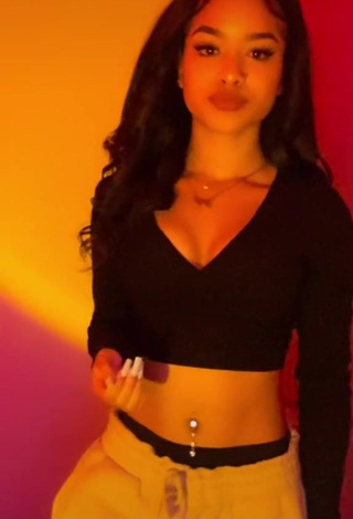 Lanii Kay Shows Sexy Black Crop Top and Cleavage