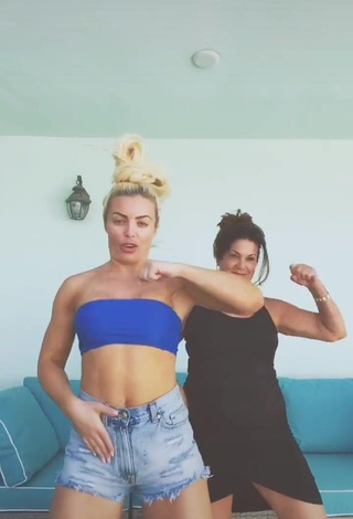 1. Hot Mandy Rose Shows Cleavage in Blue Tube Top