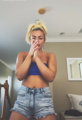 Sexy Mandy Rose Shows Cleavage in Blue Tube Top