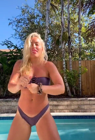 3. Desirable Mandy Rose Shows Cleavage in Purple Bikini and Bouncing Boobs