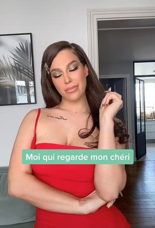 3. Hot Océane Shows Cleavage in Red Dress