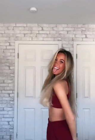 4. Sweetie Olivia Massucci Shows Cleavage in Red Crop Top