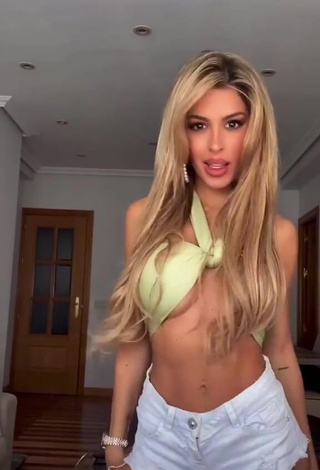 3. Desirable Oriana Marzoli Shows Cleavage in Olive Crop Top