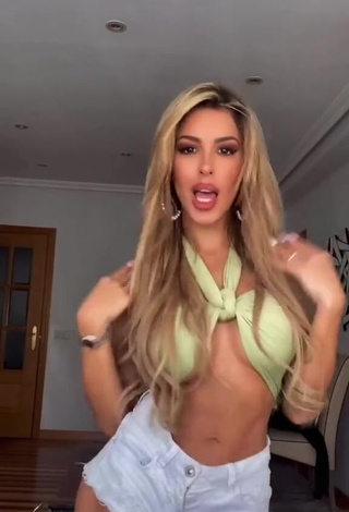 4. Desirable Oriana Marzoli Shows Cleavage in Olive Crop Top