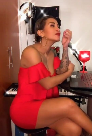 3. Erotic Paula Arias Shows Cleavage in Red Dress