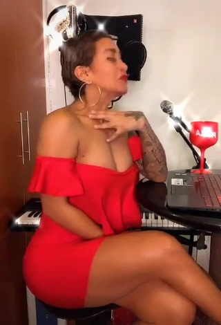 4. Erotic Paula Arias Shows Cleavage in Red Dress