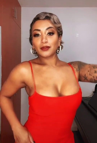 3. Desirable Paula Arias Shows Cleavage in Red Dress