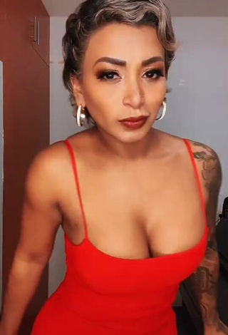 4. Desirable Paula Arias Shows Cleavage in Red Dress