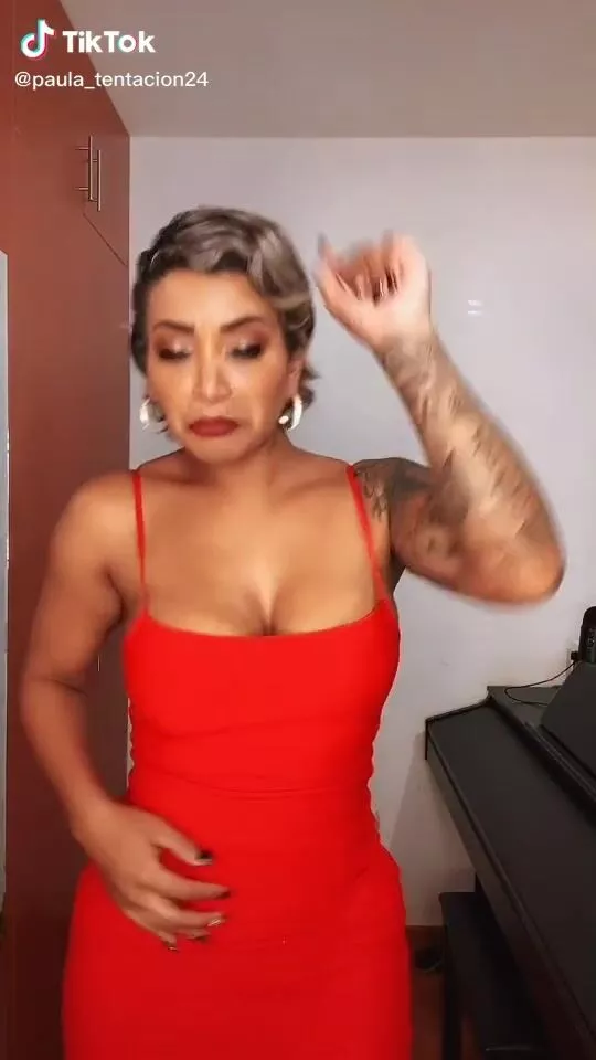 Desirable Paula Arias Shows Cleavage in Red Dress