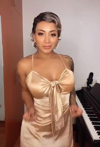 1. Sexy Paula Arias Shows Cleavage in Beige Dress