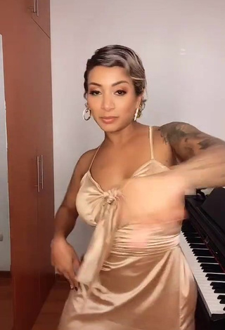 4. Sexy Paula Arias Shows Cleavage in Beige Dress