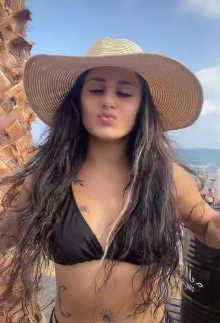 Hot Meryem Shows Cleavage in Black Bikini