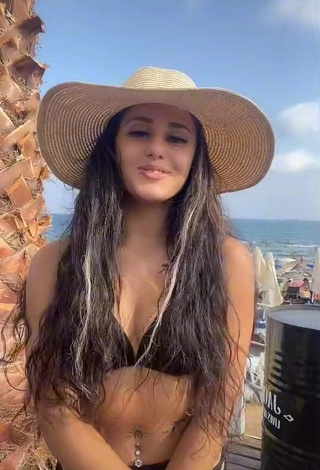 3. Hot Meryem Shows Cleavage in Black Bikini