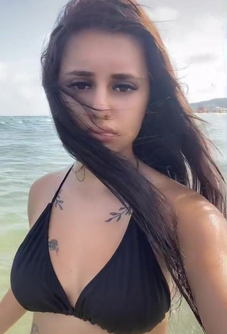 Hot Meryem Shows Cleavage in Black Bikini Top