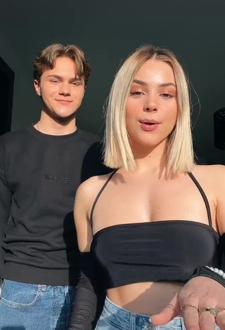 1. Sexy Romane Bertrand Shows Cleavage in Black Crop Top