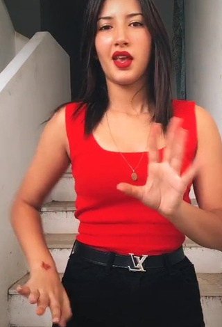 1. Hot Sabee Saidi Shows Cleavage in Red Tank Top