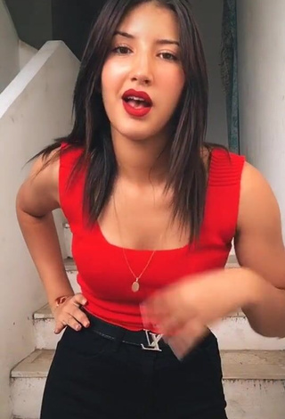 Hot Sabee Saidi Shows Cleavage in Red Tank Top