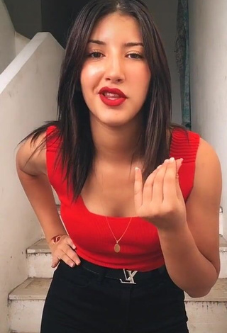 3. Hot Sabee Saidi Shows Cleavage in Red Tank Top