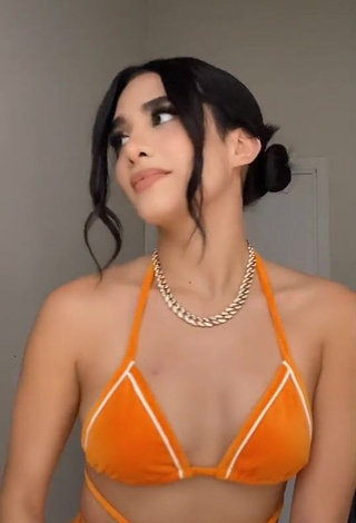 3. Sexy Sam Espinosa Osuna Shows Cleavage in Orange Bikini Top