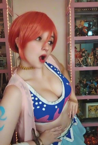 1. Seductive San Chan Claudia Shows Cleavage