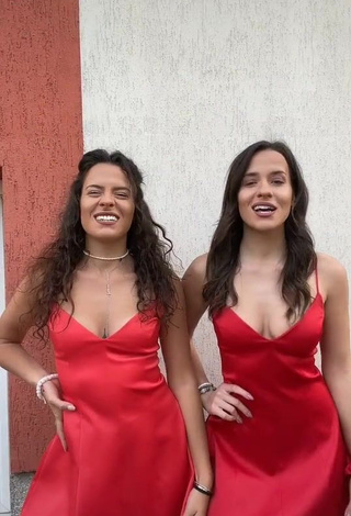 1. Hot Suzie & Reni Shows Cleavage in Red Dress