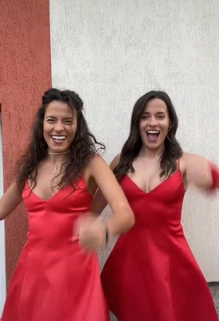 Hot Suzie & Reni Shows Cleavage in Red Dress