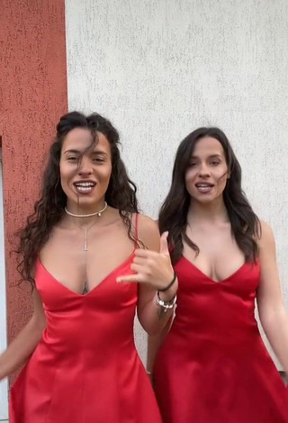 3. Hot Suzie & Reni Shows Cleavage in Red Dress