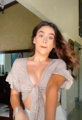 Sweetie Anahí Shows Cleavage in Checkered Crop Top