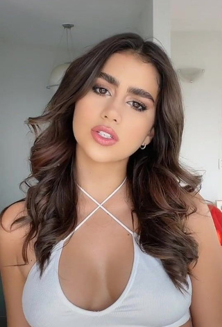 Sexy Anahí Shows Cleavage in White Crop Top